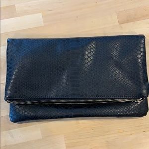 Fold over snake skin clutch
